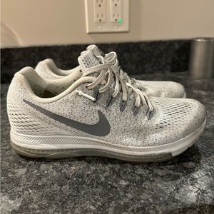 Gray Nike running sneakers, size 8.5